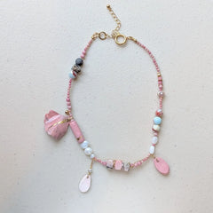 Playful Pink Hue Necklace - Featuring natural stones and pearls with hand-made porcelain charms